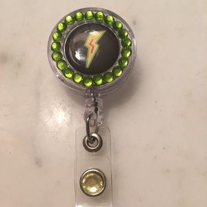 Lightening Bolt badge reel